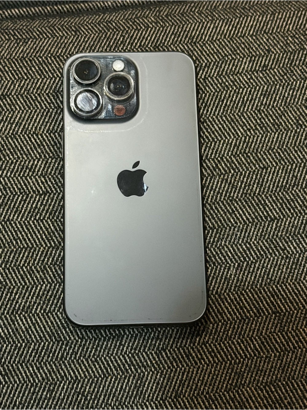 Apple Silver iPhone with Black Apple Logo and Triple Camera
